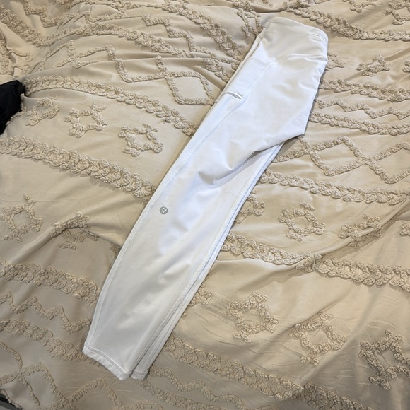 Lululemon leggings w/ zipper on back and side pockets - Picture 2 of 3